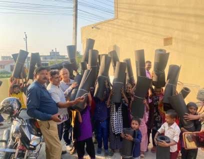 Saathi mat distribution — upcycled EVA products