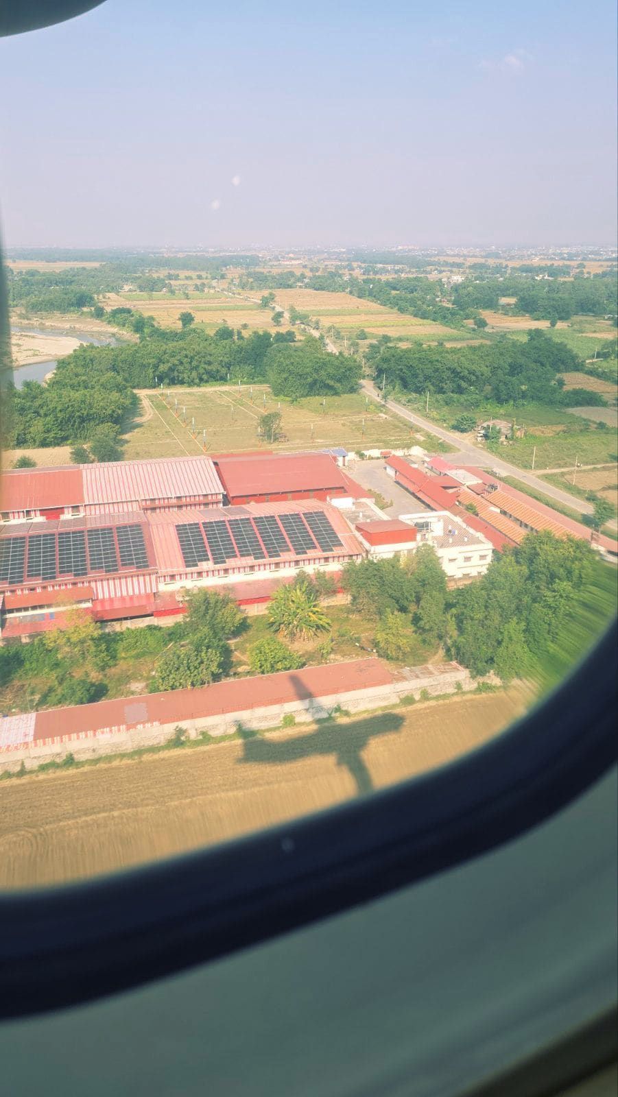Aerial view of solar panels covering the factory rooftop in Biratnagar
